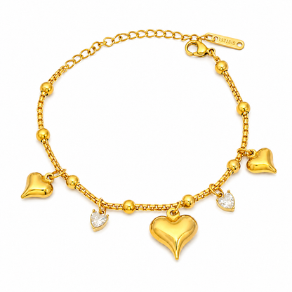 Golden Heartbeat Charm Bracelet with gold heart charms and sparkling heart-shaped CZ stones on a gold chain