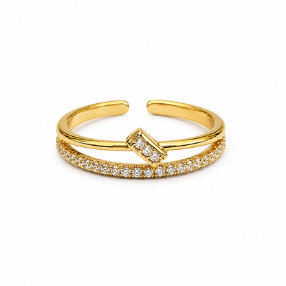 Amalthea Pavé Ring in gold stainless steel featuring a sparkling pavé crystal centerpiece and adjustable open-band design, waterproof, anti-tarnish, lightweight, and hypoallergenic for everyday wear.