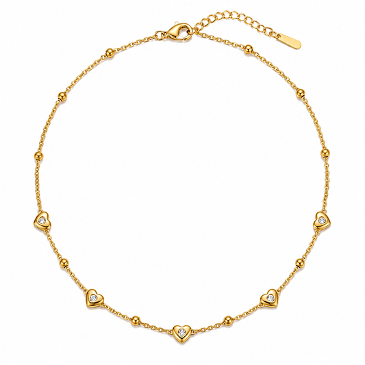Heart & Halo Gold Necklace with heart-shaped crystal accents, dainty gold chain and beaded details