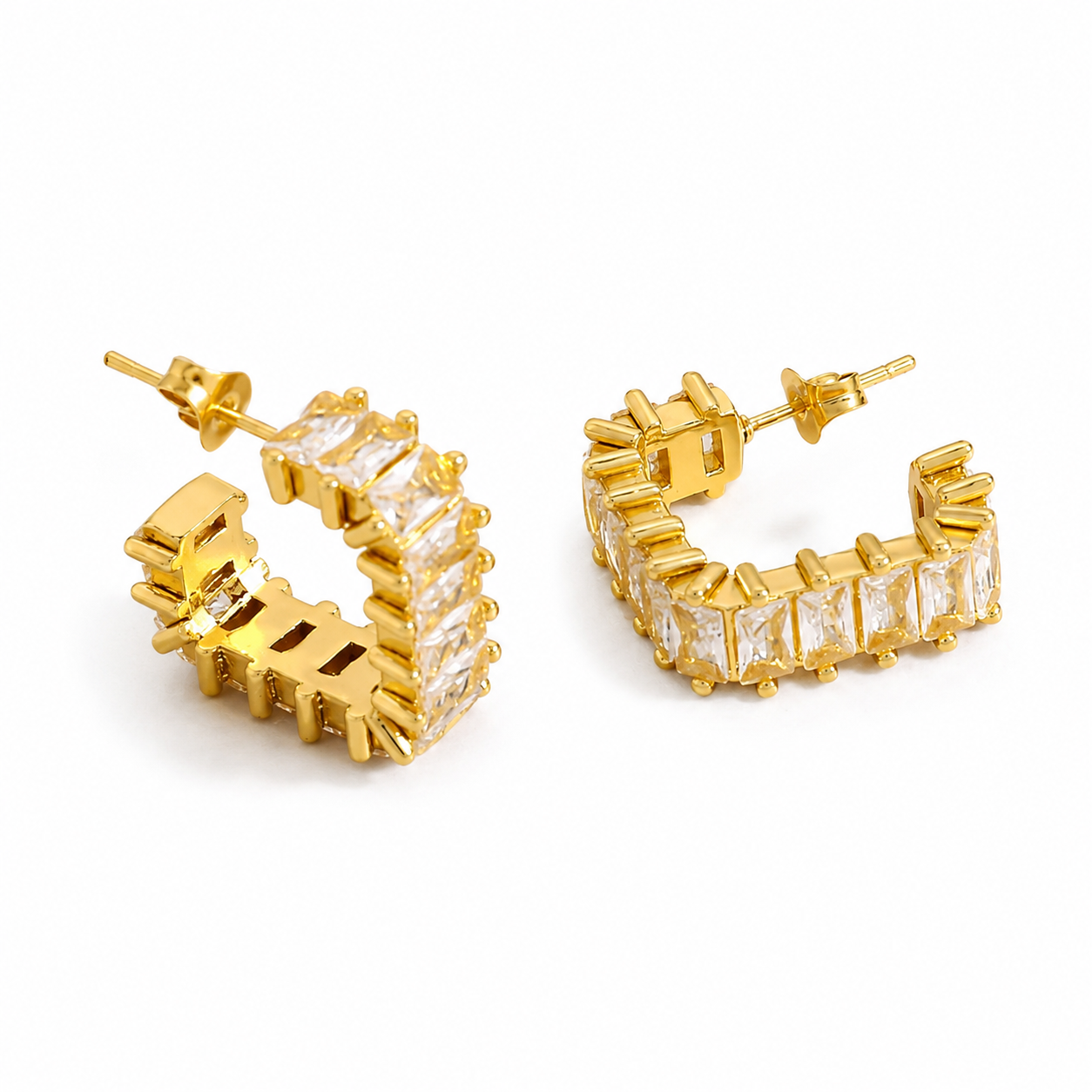Monaco Baguette Earrings in gold featuring sparkling baguette-cut cubic zirconia, waterproof, anti-tarnish, lightweight stainless steel huggie hoops for women.