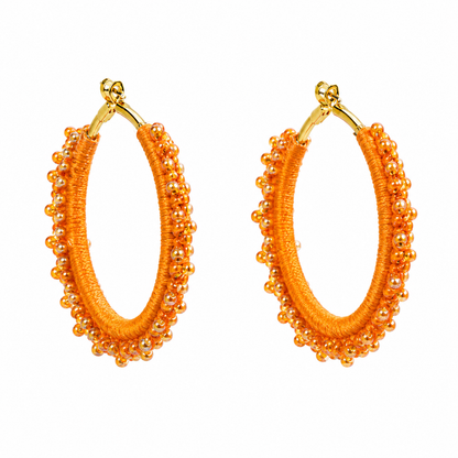 Coral hand-crocheted beaded round hoop earrings with coral beads, handmade lightweight waterproof jewellery