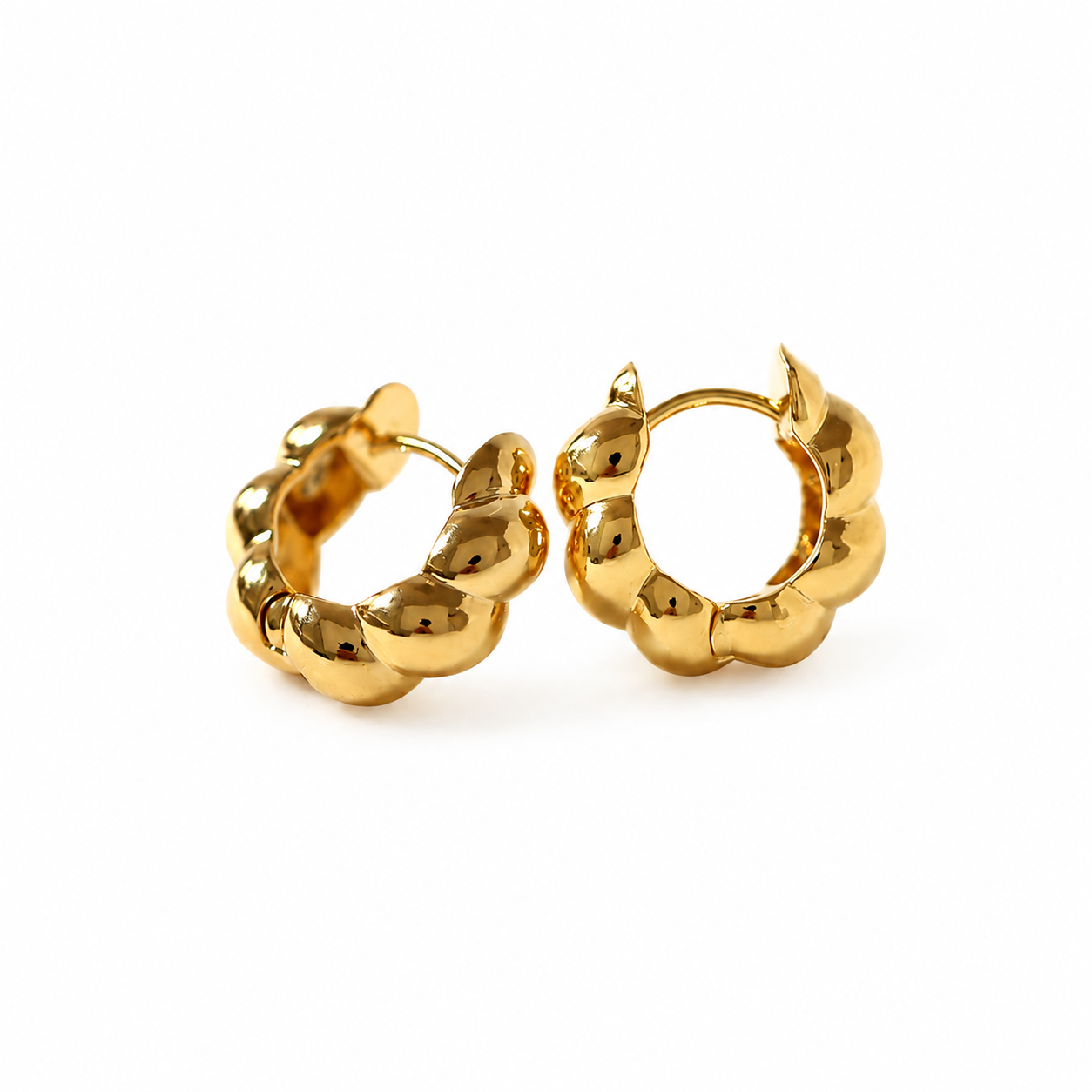 Pair of shiny 18K gold plated croissant huggie hoop earrings made of waterproof stainless steel for women.